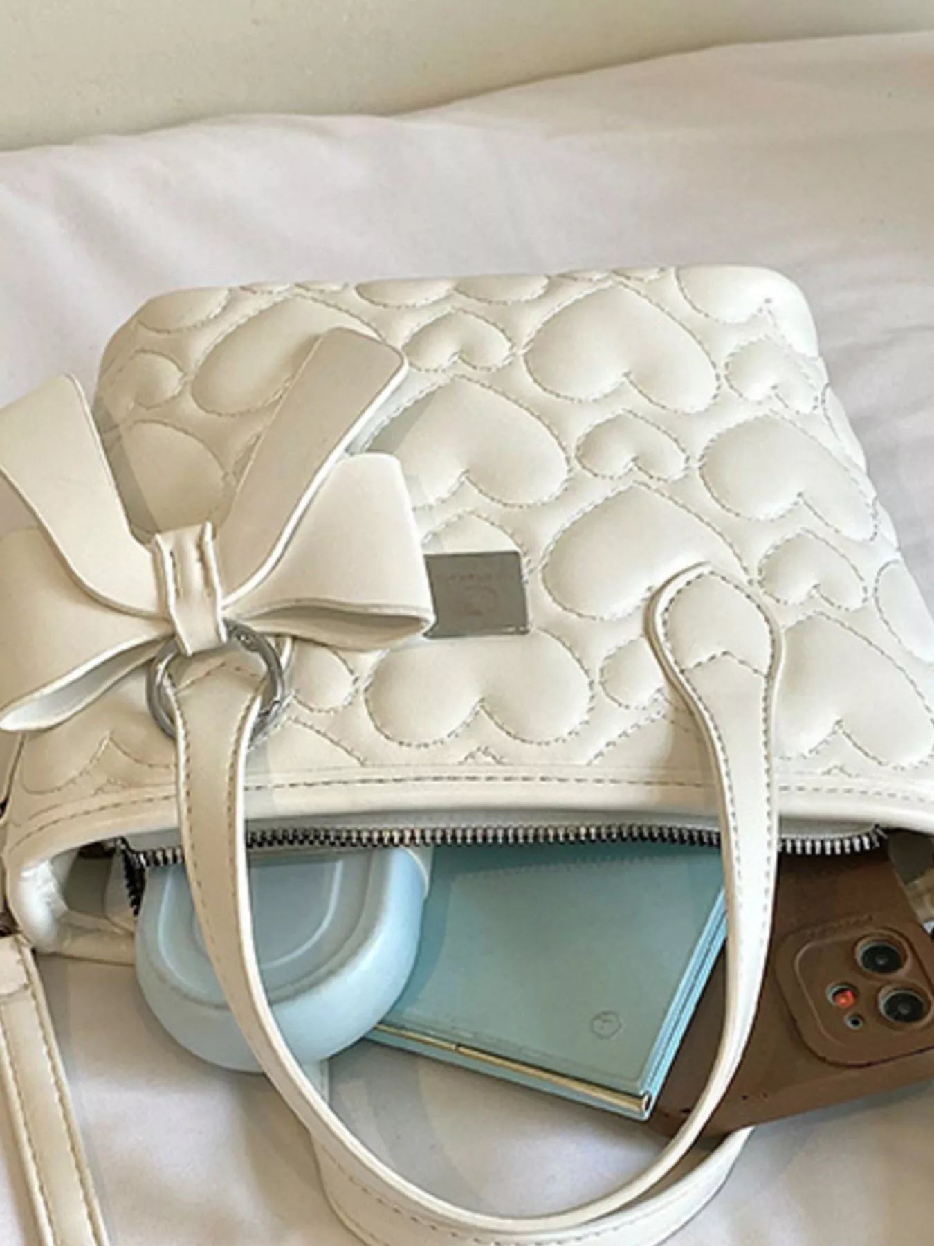 Chic Quilted Heart Crossbody Bag with Bow Accent