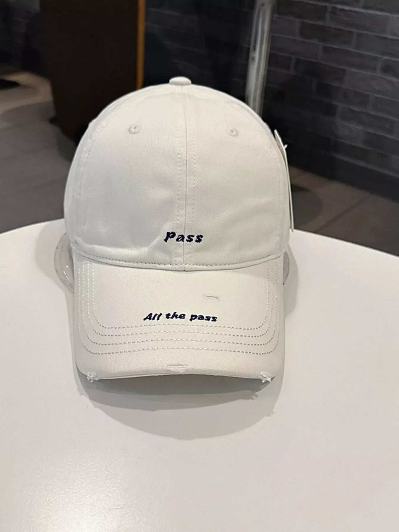 Distressed Baseball Cap with Embroidered Slogan