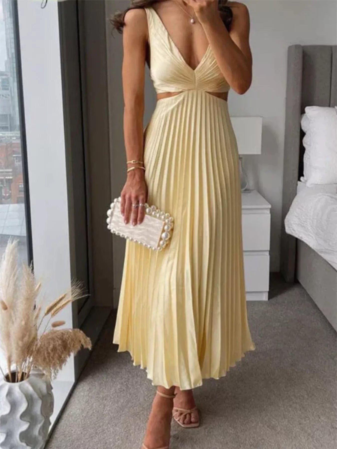 Elegant Pleated Midi Dress with Cut-out Details