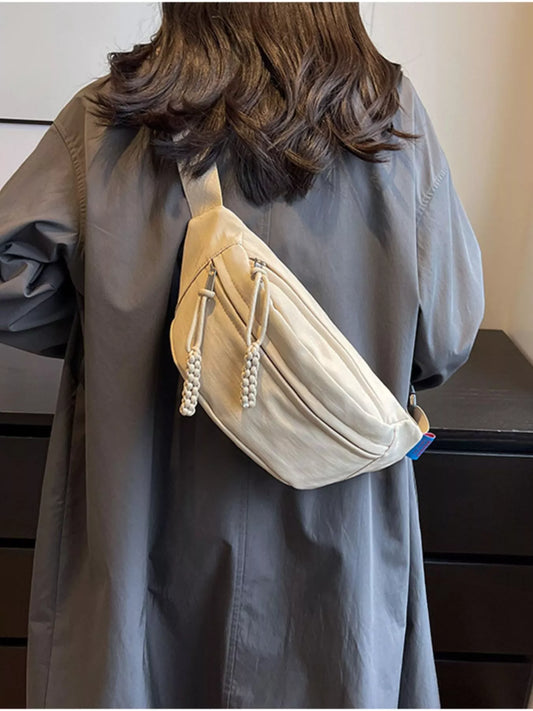 Lightweight Crossbody Bag with Tassel Detail