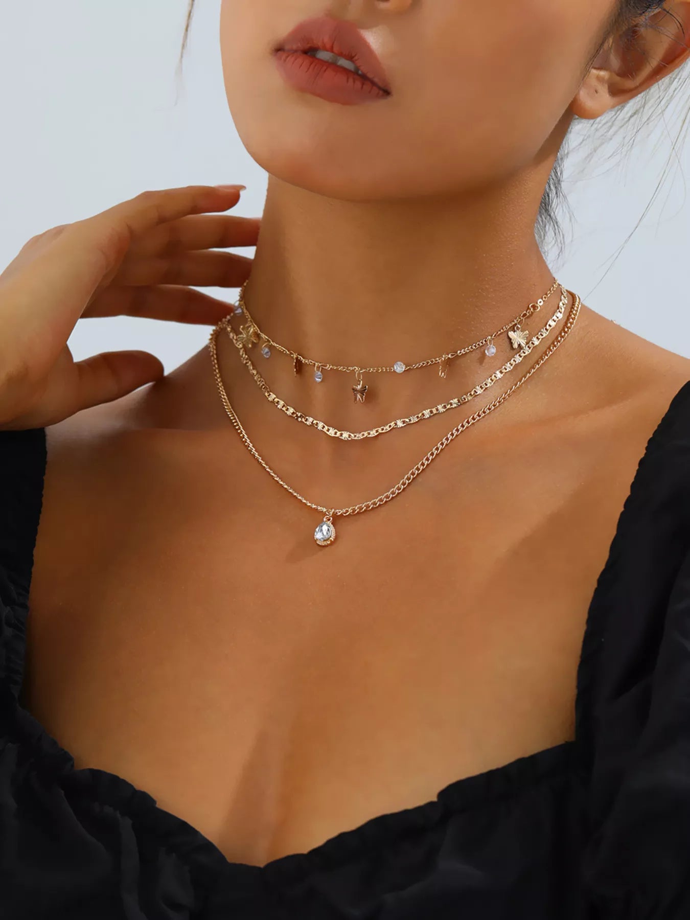 Layered Alloy Necklace with Butterfly and Zircon Charms