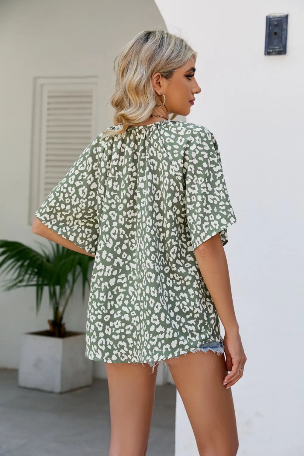 Leopard Notched Half Sleeve Blouse
