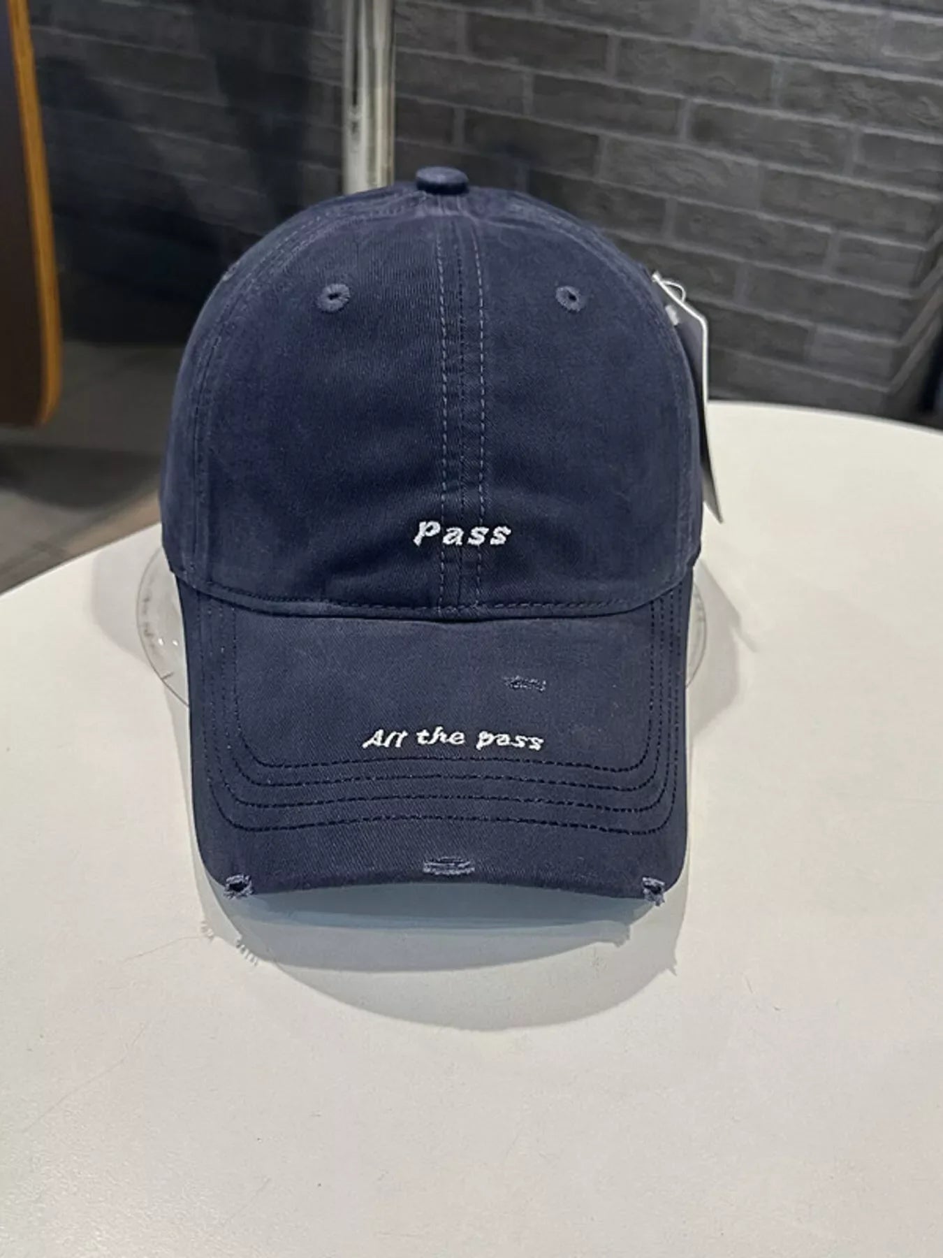 Distressed Baseball Cap with Embroidered Slogan