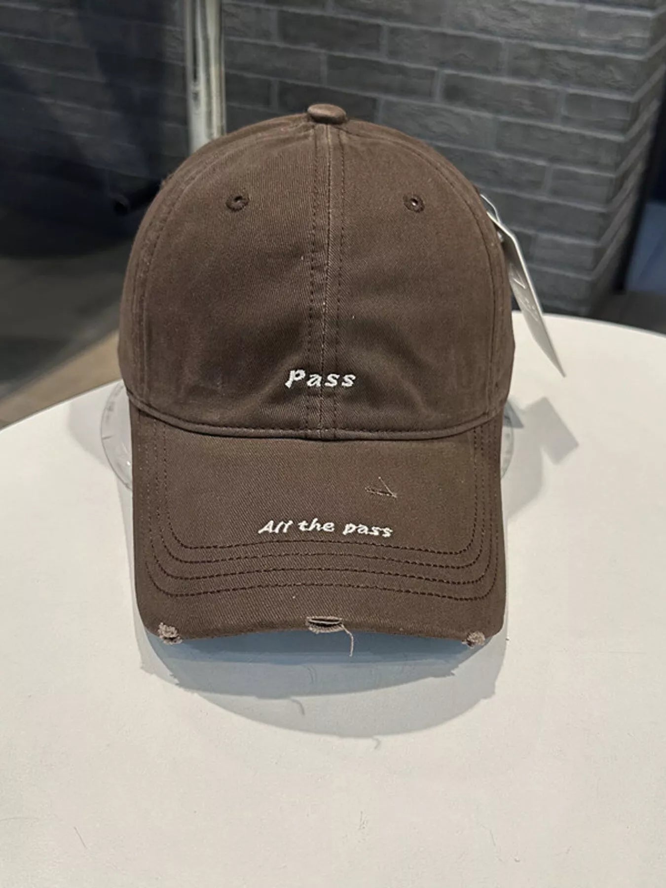 Distressed Baseball Cap with Embroidered Slogan