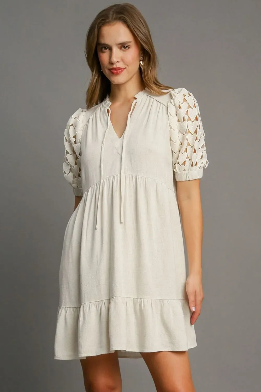 Umgee Full Size Ruffled Hem Heart Lace Sleeve Tie Neck Dress Plus Size