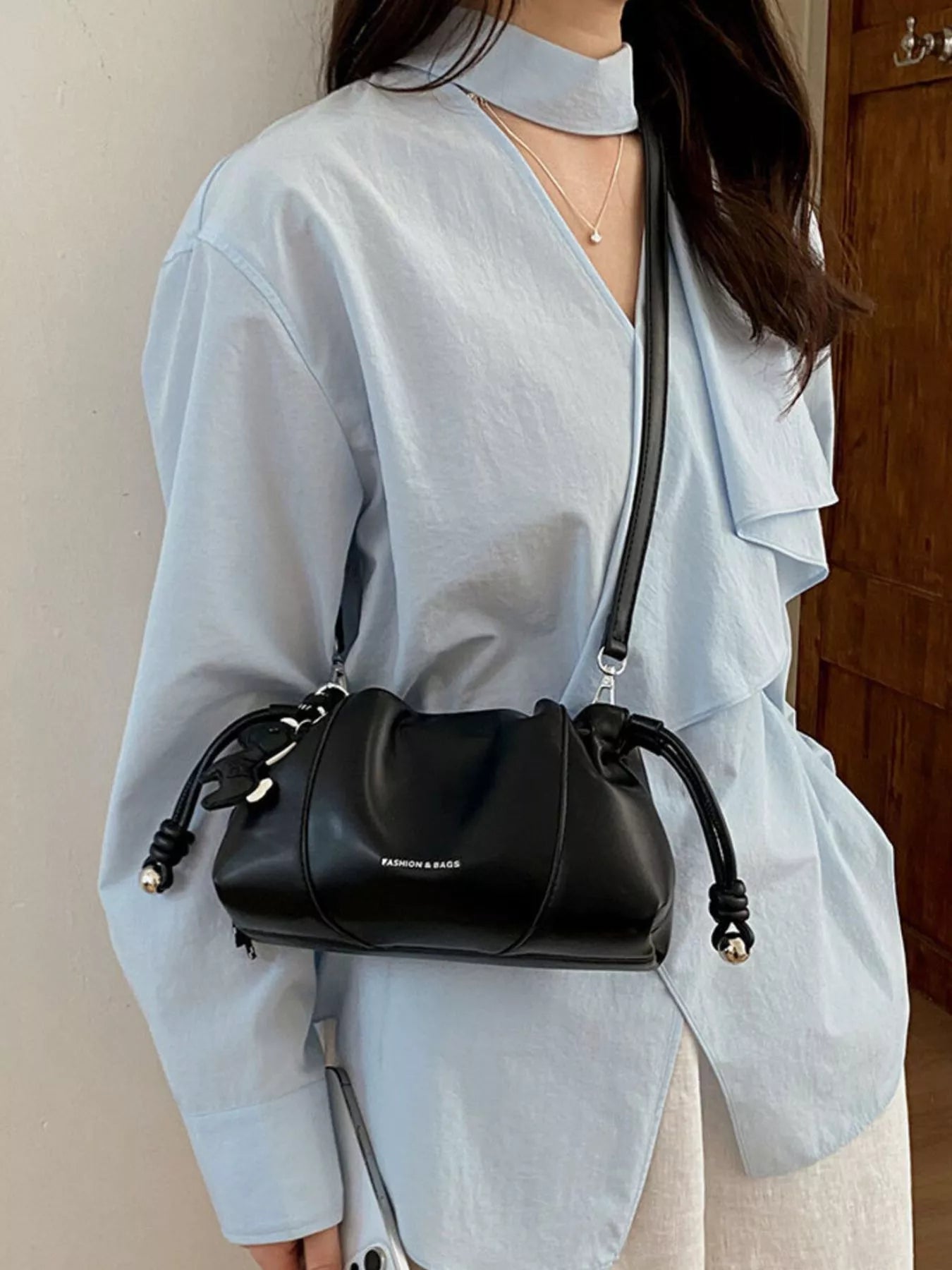 Drawstring Leather Crossbody Bag