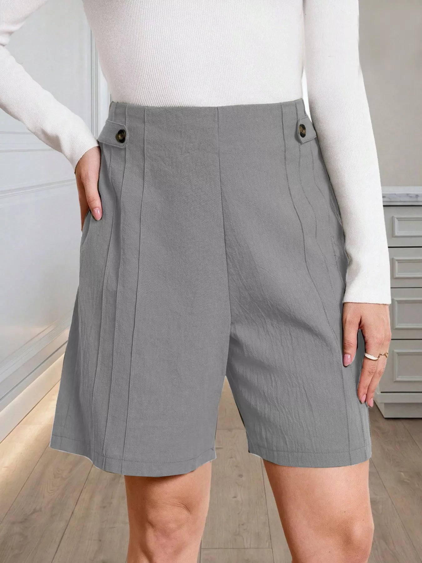 High-Waisted Pleated Shorts with Button Detail