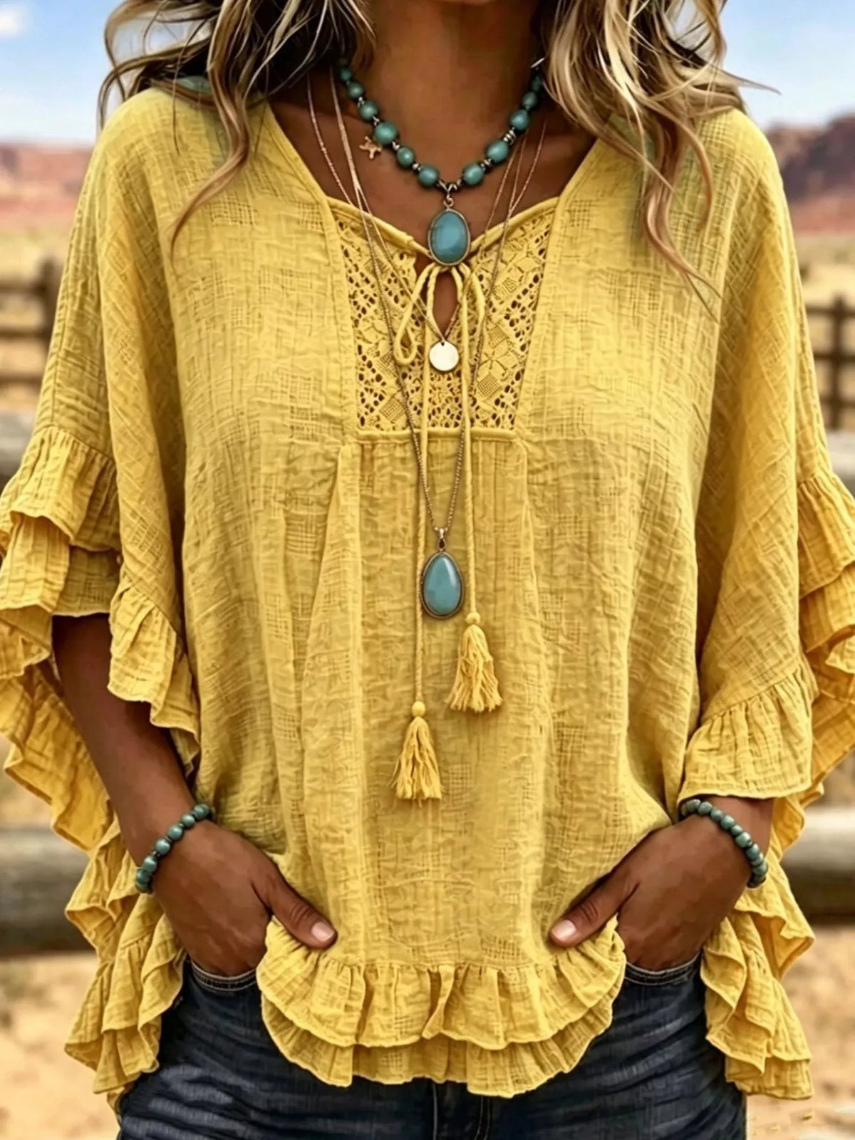 Full Size Tassel Tie Neck Ruffled Hem Blouse Plus Size