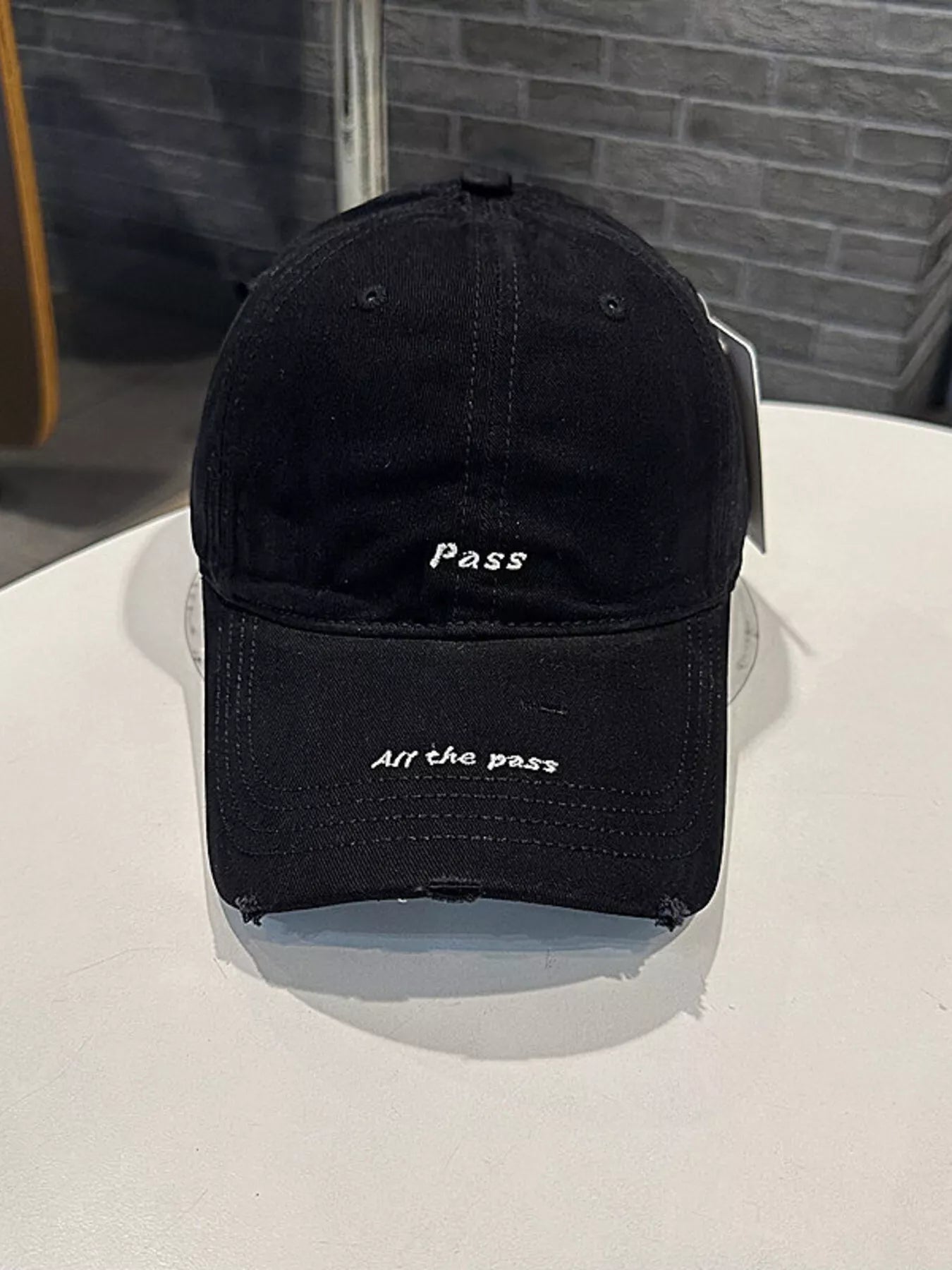 Distressed Baseball Cap with Embroidered Slogan