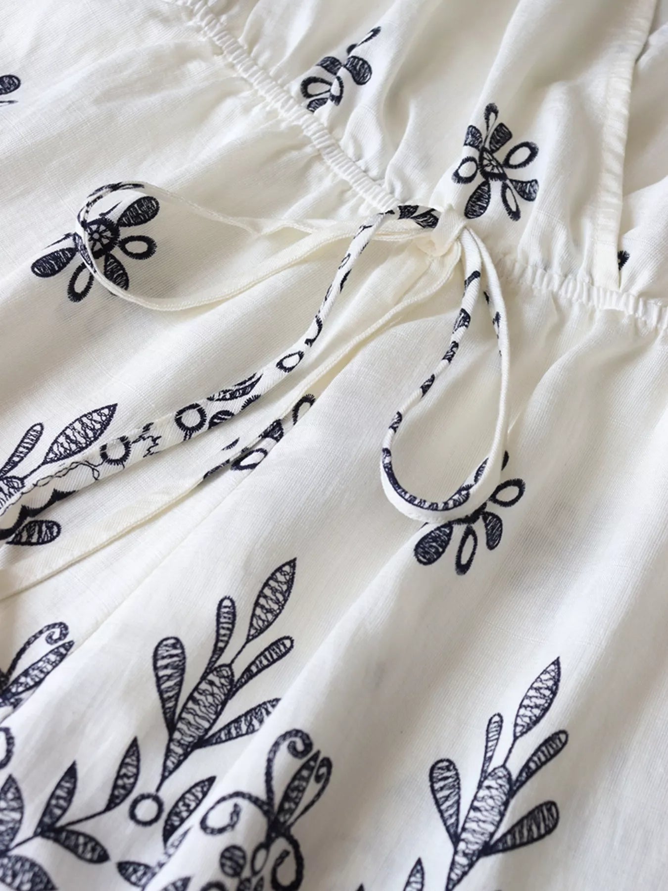 Printed Surplice Half Sleeve Romper