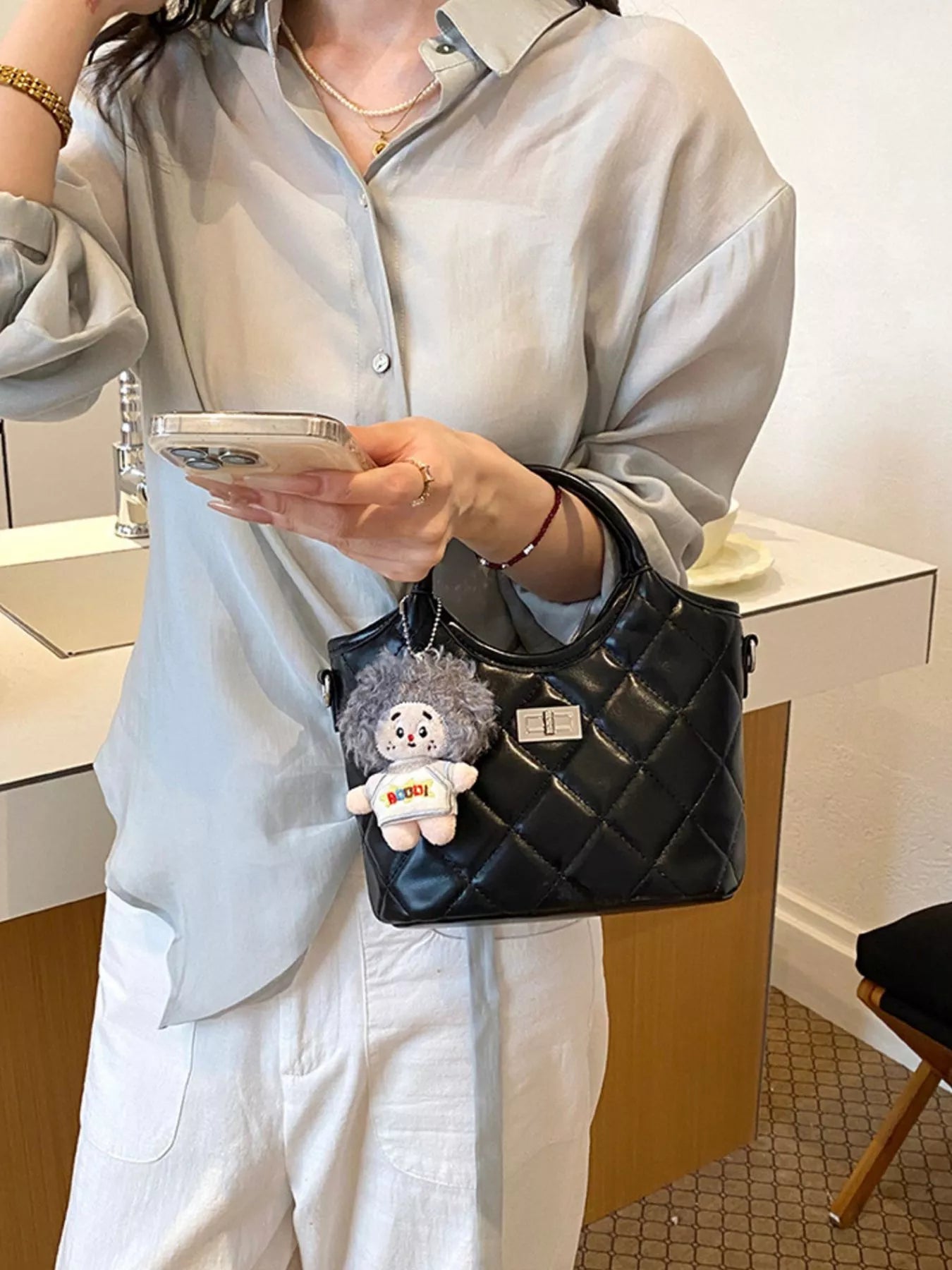 Quilted Crossbody Bag with Plush Charm