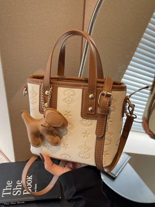 Embossed Pattern Dog Charm Crossbody Bag