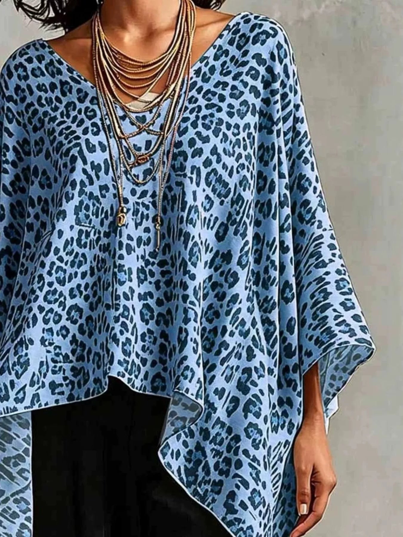 Full Size Leopard Print Asymmetrical Hem Top Plus Size