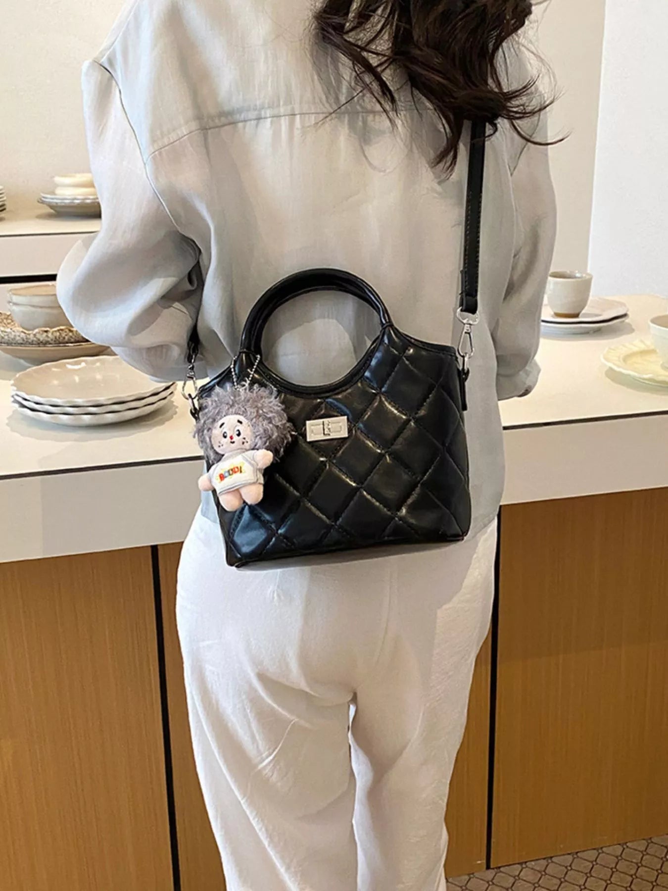 Quilted Crossbody Bag with Plush Charm